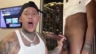 Tatted guy sucks big black cock