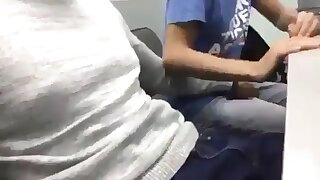 Friends groping and jerking off in the school library