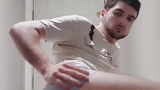 Young guy jerks off his tiny dick and shows ass