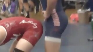 Wrestlers bulge touches opponents ass in hot accident.