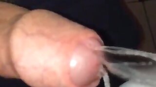 Guy with a hard on pissing