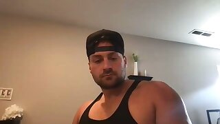 He jerks off his cock and shoots all over his black t-shirt