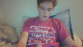 Cute blonde teen jerks his dick on a webcam