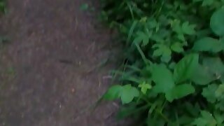 Dude walking in the woods with his small uncut dick ... out of his pants