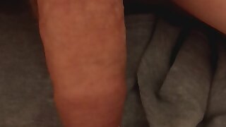 Uncut, neg bottom jerks off and cums.