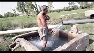 Indian daddy taking bath in tubewell