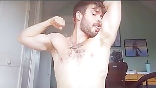Musky hunk sniffing own pits