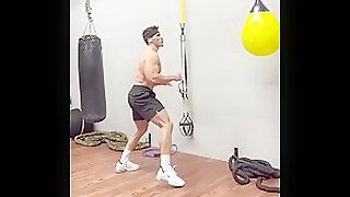 Logan Foote shows off his lean muscular body kickboxing