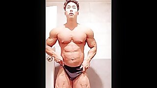 Muscle Asian Stud flexes his Beefy Body