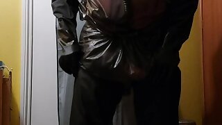 Wanking in plastic gear and waders