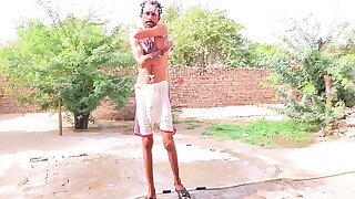 Desi villager bathing at his house front