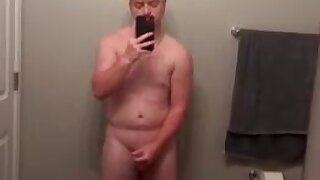 Cute ginger stroking is cock in bathroom cums on towel