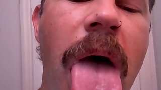 Sexy daddy drooling and spitting showing off his massive tongue