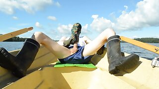 Cumming in the boat after rowing