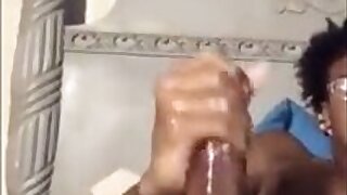Black teen stroking dick in glasses