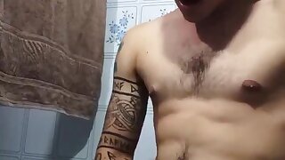 He cums sneakily in the bathroom while other people are in the house