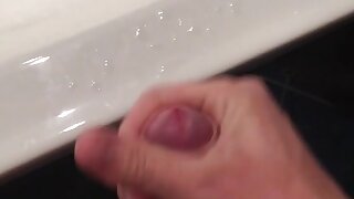 Quick and short video of jack off and cumming all over in the bathroom