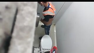 Man caught masturbating and ejaculating in the bathroom.