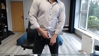 Beefy stud strips and shows off his muscled body and big uncut cock