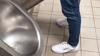 2 guys with nice dicks pissing at a urinal then jacking off and cumming