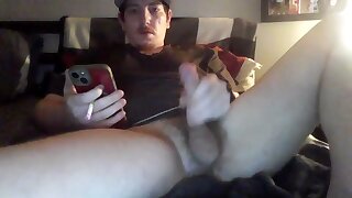 He takes a smoke break while jerking off his bushy dick