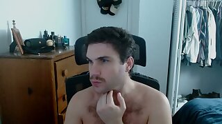 He jerks off his bushy cock in his room