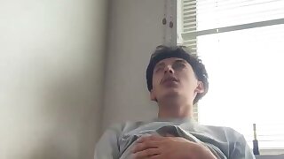 Young stud jerks off in his bedroom and gives himself and amazing orgasm you can see on his face.